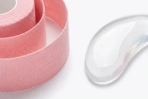 Wholesale B2B comparison of medical-grade silicone vs cotton face tape for distributors