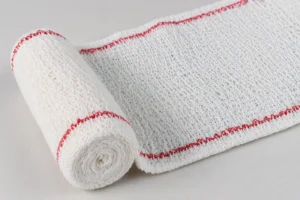 A close up showing the woven texture and non fraying edge from a reliable elastic crepe bandage manufacturer